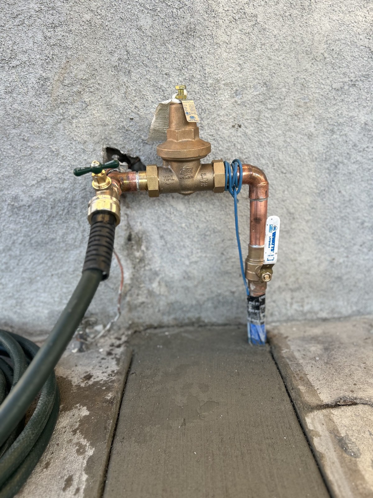 Finished water line with new pressure regulator and hose bib